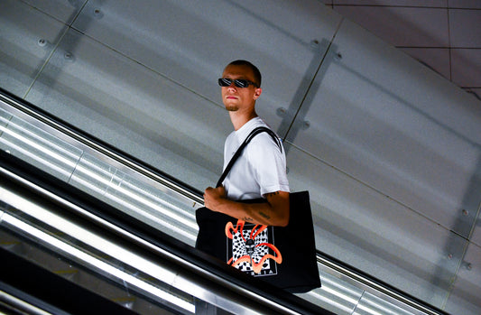 Liquid as a brick canvas tote bag black